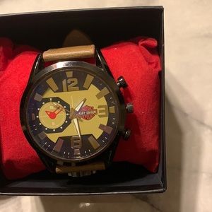 Tan  and black men’s watch